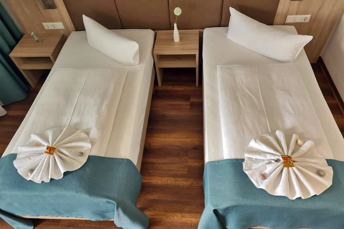 Bett im Twinbettzimmer (geteilt)